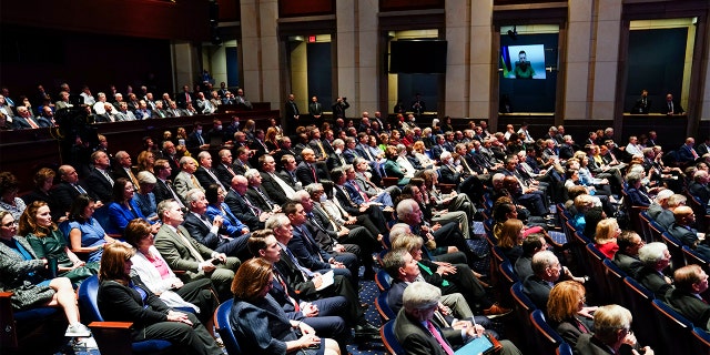 Ukrainian President Volodymyr Zelenskyy delivers a virtual address to Congress by video at the Capitol in Washington, Wednesday, March 16, 2022. 