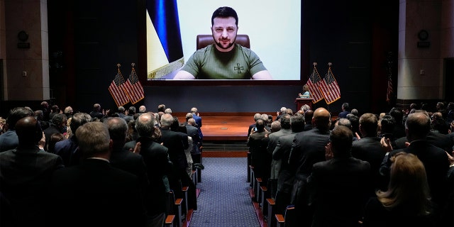 Ukrainian President Volodymyr Zelenskyy delivers a virtual address to Congress by video at the Capitol in Washington, Wednesday, March 16, 2022. 