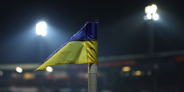 A corner flag replaced by a Ukraine flag on the pitch during the FA Cup fifth- round soccer match between Luton Town and Chelsea at Kenilworth Road in Luton, England, Wednesday, March 2, 2022.