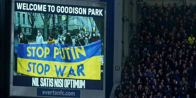 A screen shows support for Ukraine before an English Premier League soccer match between Everton and Manchester City at Goodison Park in Liverpool, England, Feb. 26, 2022.