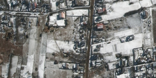 Troops and military vehicles deployed in Ozera, northeast of Antonov Airport