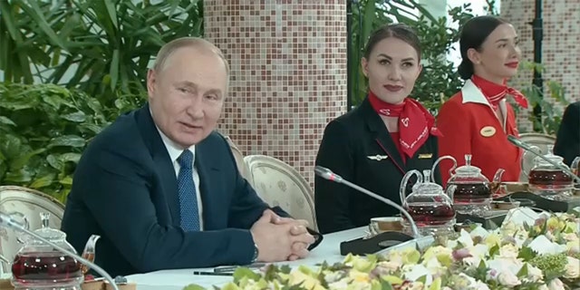 Russian President Vladimir Putin spoke to female flight attendants in comments broadcast on state television on Saturday, March 5, 2022. (Image: Reuters Video)