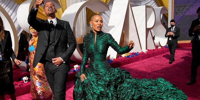 Will Smith and Jada Pinkett Smith arrive at the Oscars on Sunday, March 27, 2022, at the Dolby Theatre in Los Angeles.