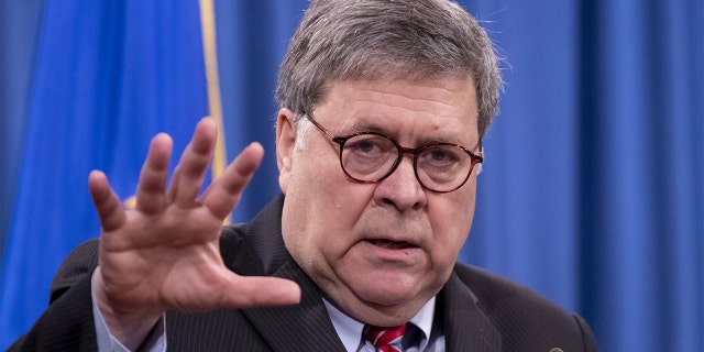 Attorney General William Barr speaks during a news conference at the Department of Justice in Washington, Dec. 21, 2020.