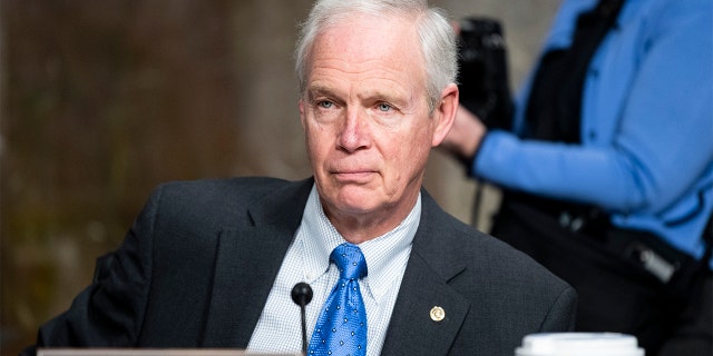 Sen. Ron Johnson takes his seat for a Senate Foreign Relations subcommittee hearing, Feb. 16, 2022.