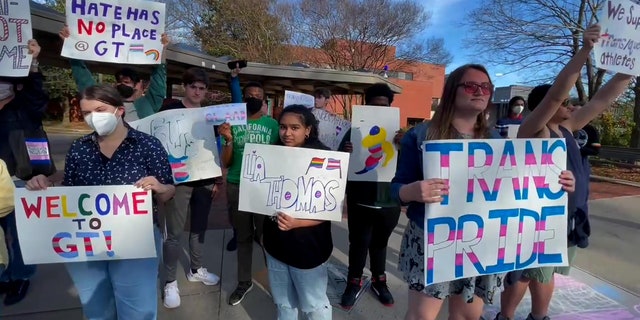 Georgia Tech's Grad Pride club attended the protest to show support for trans athletes Lia Thomas and Iszac Henig.