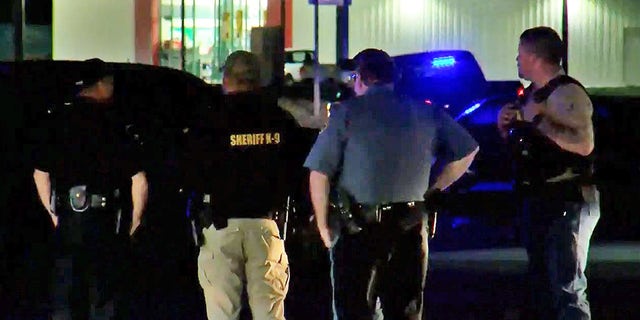 Law enforcement officers on the scene of a shooting in Dumas, Arkansas, March 19, 2022. (FOX 16 of Little Rock)