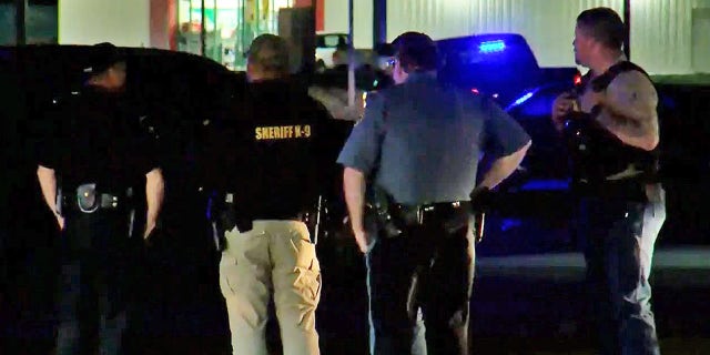 Law enforcement officers on the scene of a shooting in Dumas, Arkansas, March 19, 2022. (FOX 16 of Little Rock)