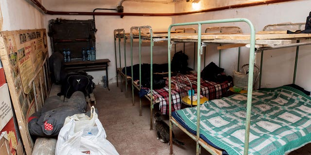 Beds and personal items are shown in a bomb shelter area at the Interpipe Steel plant in Dnipro, Ukraine, Thursday, March 10, 2022.