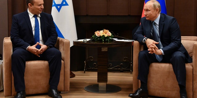 Russian President Vladimir Putin attends a meeting with Israeli Prime Minister Naftali Bennett