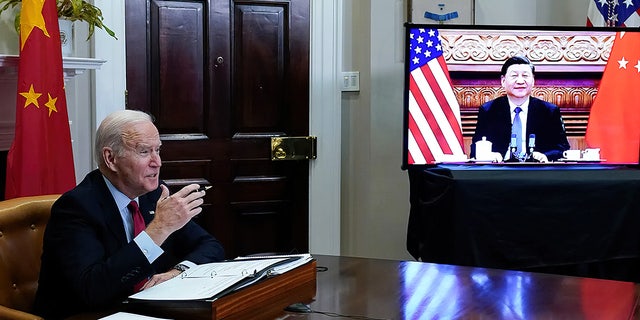 President Biden meets virtually with Chinese President Xi Jinping from the Roosevelt Room of the White House in Washington, on Nov. 15, 2021.