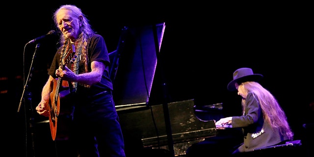 Willie Nelson (L) and sister Bobbie Nelson perform in concert on New Years Eve at ACL Live on December 31, 2014 in Austin, Texas.
