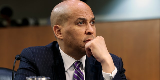 Sen. Cory Booker (D-NJ) listens as U.S. Supreme Court nominee Judge Ketanji Brown Jackson testifies during her confirmation hearing before the Senate Judiciary Committee in the Hart Senate Office Building on Capitol Hill, March 22, 2022 in Washington, DC. 