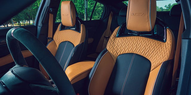 Sport seats feature a carbon fiber shell and massage function.