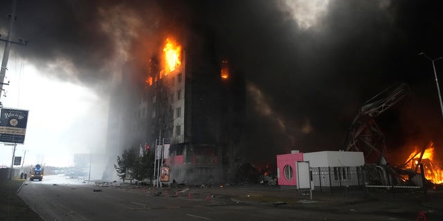 A building burns after shelling in Kyiv, Ukraine, Thursday, March 3, 2022. 