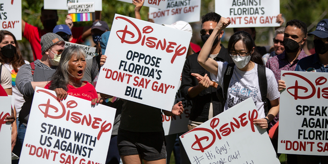 Walt Disney employees and demonstrators during a rally against the Florida "Don't Say Gay" bill at Griffith Park in Glendale, California, U.S., Photographer: Alisha Jucevic/Bloomberg via Getty Images