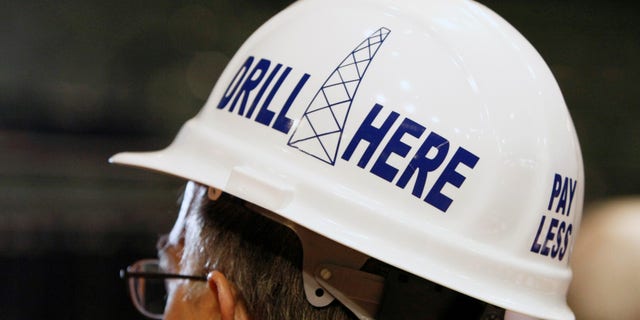 A delegate from Alaska wears a hard hat in support of drilling for oil at the second session at the 2008 RNC in St. Paul. REUTERS/Rick Wilking