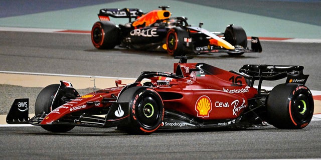 Charles Leclerc's red Ferrari and Max Verstappen's blue Red Bull battled for the lead over several laps during the Formula One Bahrain Grand Prix.