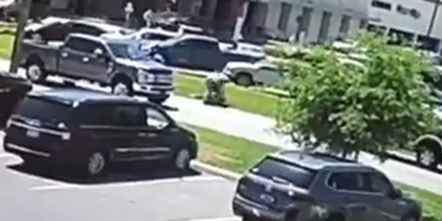 In this still image from surveillance video, Winter Haven police say a suspect, identified as Donald Ray Walker, pummeled a 73-year-old in a Publix Parking lot in Winter Haven on Saturday.