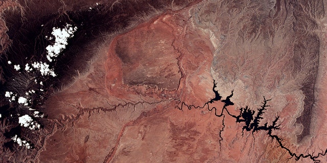 A vertical view of the Arizona-Utah border area showing the Colorado River and Grand Canyon photographed from the Skylab 1/2 space station in Earth orbit. (Photo by: HUM Images/Universal Images Group via Getty Images)