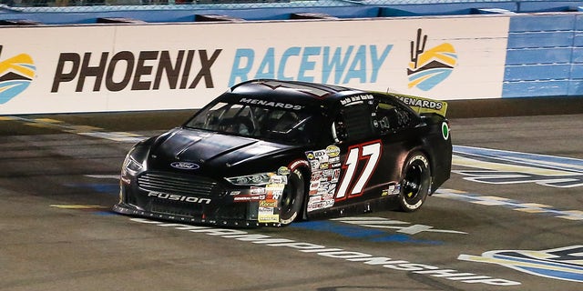 Taylor Gray, driver of the No. 17 Ford Performance Ford, crosses the finish line to win the ARCA Menards Series General Tire 150 March 11, 2022, at Phoenix Raceway in Avondale, Arizona. 