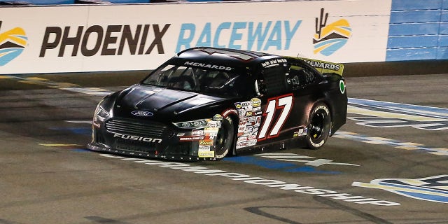 Taylor Gray, driver of the No. 17 Ford Performance Ford, crosses the finish line to win the ARCA Menards Series General Tire 150 March 11, 2022, at Phoenix Raceway in Avondale, Arizona.