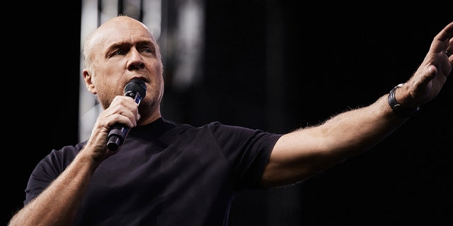 Pastor Greg Laurie is shown during one of his Harvest faith events. "Most of all," he told Fox News Digital of his new film, "'Jesus Revolution' brims with hope. And that is something we all need a lot more of right now."