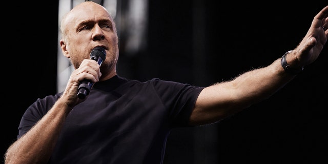 Pastor Greg Laurie is shown during one of his Harvest faith events. "Most of all," he told Fox News Digital of his new film, "'Jesus Revolution' brims with hope. And that is something we all need a lot more of right now."