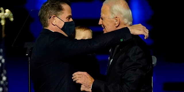 Joe Biden embraces his son Hunter Biden after addressing the nation from the Chase Center Nov. 7, 2020 in Wilmington, Delaware.