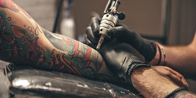 One tattoo artist who spoke with reporters said that 70% of the proceeds from her work will go to the Ukrainian army.