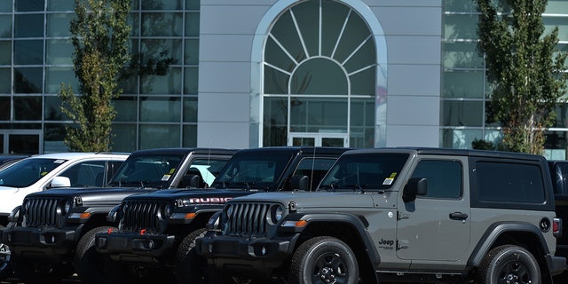 New jeep vehicles parked outside a Chrystler, Jeep, Dodge and RAM dealer in South Edmonton.  Wednesday, August 24, 2021 in Edmonton, Alberta, Canada.  (Photo by Artur Widak / NurPhoto via Getty Images)