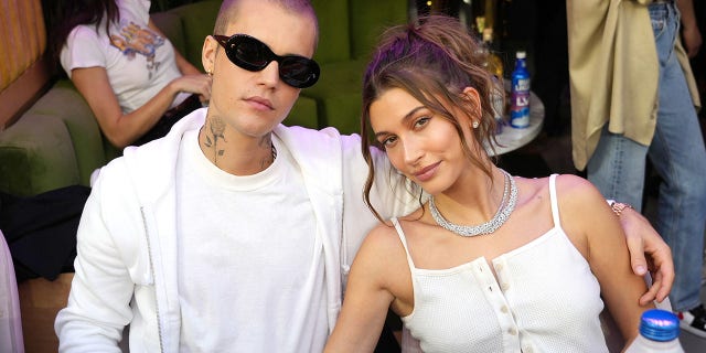 Justin Bieber and Hailey Bieber attend Super Bowl LVI at SoFi Stadium in February.