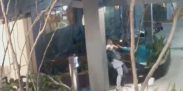 The suspects held the victim at gunpoint and demanded his watch, police said.