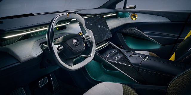 The upscale interior features several digital displays.