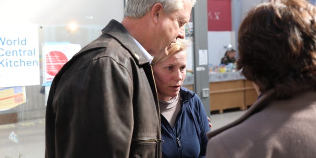 At a refugee center in Poland, Sen. Marshall comforts Katarina, a proud Ukrainian who said she wants her country back, wants to go home, but most of all wants peace. (Sen. Roger Marshall’s office)