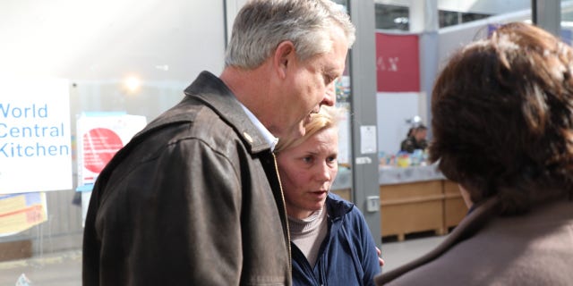 At a refugee center in Poland, Sen. Marshall comforts Katarina, a proud Ukrainian who said she wants her country back, wants to go home, but most of all wants peace. (Sen. Roger Marshall’s office)