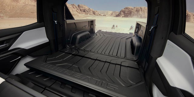 The electric Chevrolet Silverado EV has a Multi-Flex Midgate feature that allows the bed wall to be folded down into the cabin.