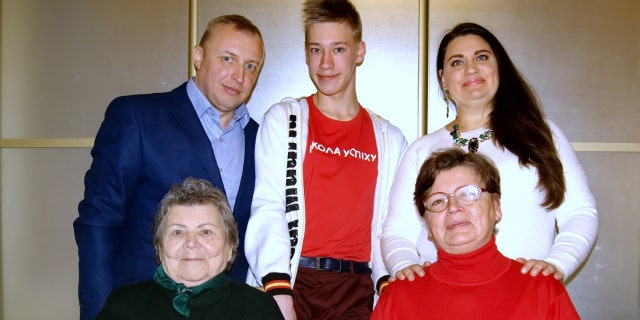 Matthew Frantsuzhan, 17 (center), an exchange student from Ukraine, poses with his father Ivan, his mother Olga, his great-grandmother Olga, 92 (first row, far left) and his grandmother Galina, 67.