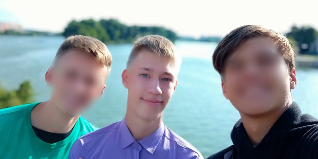 Matthew Frantsuzhan, who is studying music in Iowa, is shown in a picture with two friends from Ukraine.