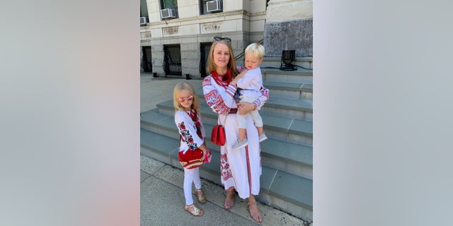 Ukrainian activist Oksana Bats with her kids.