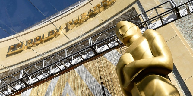 An Oscar statue is pictured underneath the entrance to the Dolby Theatre on Feb. 24, 2016, in Los Angeles. 