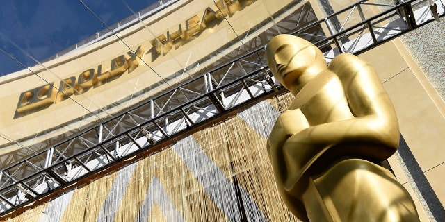 An Oscar statue is pictured underneath the entrance to the Dolby Theatre on Feb. 24, 2016, in Los Angeles.