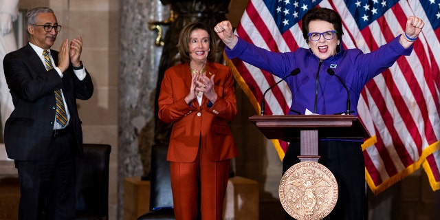 From left, Rep. Bobby Scott, D-Va., and Speaker of the House Nancy Pelosi, D-Calif., clap as tennis star Billie Jean King, founder of the Women's Sports Foundation, speaks during the Women's History Month event honoring women athletes in celebration of the 50th anniversary of Title IX in Statuary Hall in the Capitol.