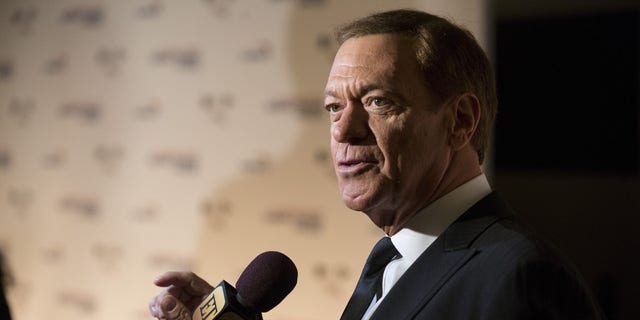 Comedian Joe Piscopo speaks to reporters as he arrives for the Mark Twain prize for Humor honoring Eddie Murphy at the Kennedy Center in Washington October 18, 2015.      