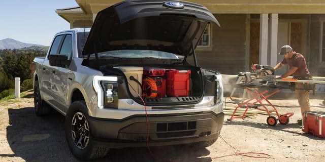 The Ford F-150 Lightning is equipped with a front trunk where the internal combustion engine would normally be.