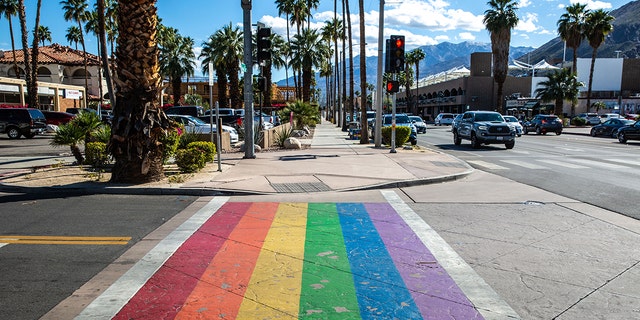 The street pedestrian crossing is painted in rainbow colors as viewed on March 7, 2022 in Palm Springs, California. 