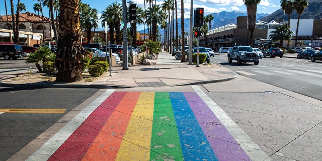 The street pedestrian crossing is painted in rainbow colors as viewed on March 7, 2022 in Palm Springs, California.