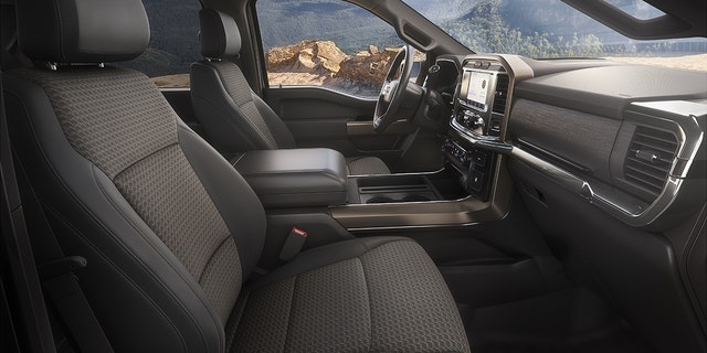 The F-150 Rattler's interior features cloth seats and bronze accents.