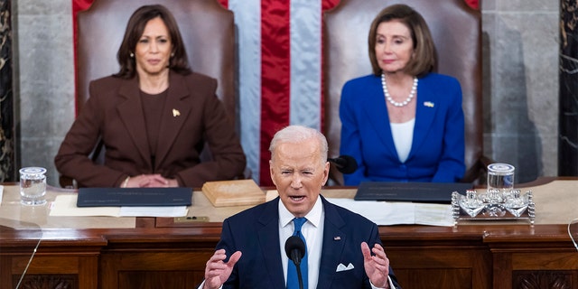 President Joe Biden ditched his signature mask for his first State of the Union address to a joint session of Congress on March 1, 2022.