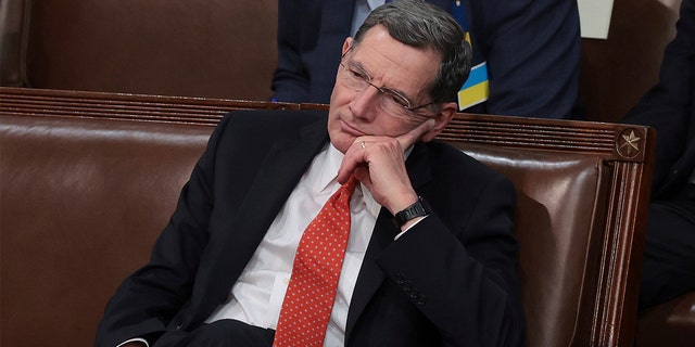 Sen. John Barrasso, R-Wyo., listens to President Joe Biden deliver his State of the Union address to a joint session of Congress at the Capitol, Tuesday, March 1, 2022, in Washington.